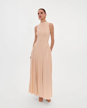 Sleeveless high-neck maxi dress with a pleated skirt